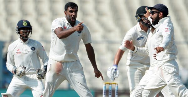 India's Ravichandran Ashwin(C) and captain Virat Kohli celebrate with teammates after the wicket of New Zealand's captain Ross Taylor during the fourth day of the second Test cricket match between India and New Zealand at The Eden Gardens Cricket Stadium in Kolkata on October 3, 2016.
----IMAGE RESTRICTED TO EDITORIAL USE - STRICTLY NO COMMERCIAL USE----- / GETTYOUT
 / AFP / Dibyangshu SARKAR        (Photo credit should read DIBYANGSHU SARKAR/AFP/Getty Images)