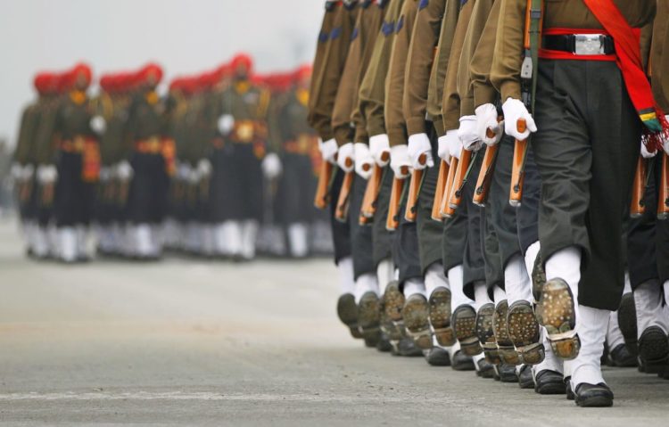 Indian paramilitary soldiers march during rehearsals for the upcoming Republic Day parade in New Delhi, India, Tuesday, Jan. 20, 2015. U.S. President Barack Obama will be the "chief guest" in this year's Republic Day parade, marked annually on Jan. 26. (AP Photo/Altaf Qadri)