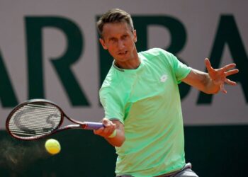 Ukraine's Sergiy Stakhovsky returns the ball to France's Gilles Simon during their men's singles first round match on day two of The Roland Garros 2019 French Open tennis tournament in Paris on May 27, 2019. (Photo by Kenzo TRIBOUILLARD / AFP) (Photo by KENZO TRIBOUILLARD/AFP via Getty Images)